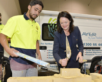 Deputy Premier Liza Harvey tries out her bricklaying skills